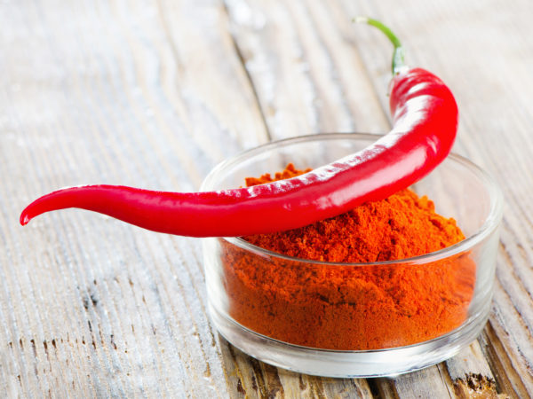 Red pepper on wooden table
