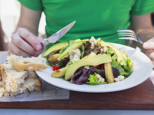 Men eating healthy lunch.